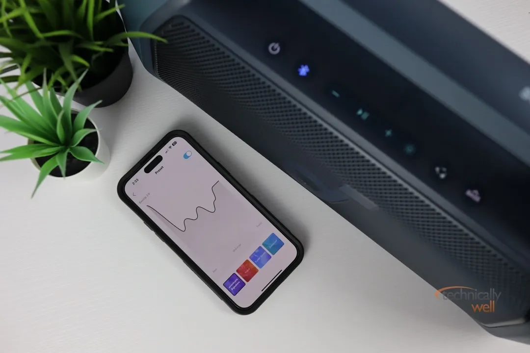 soundcore app beside the Boom 2 Plus speaker