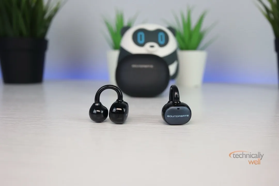 SoundPEATS UU2 earbuds in front of the charging case