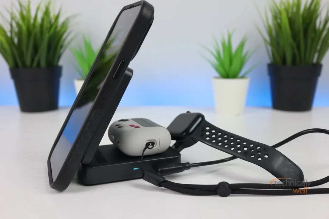 Anker MagGo 3-in-1 Charging Station with an iPhone, Apple Watch, and Apple AirPods