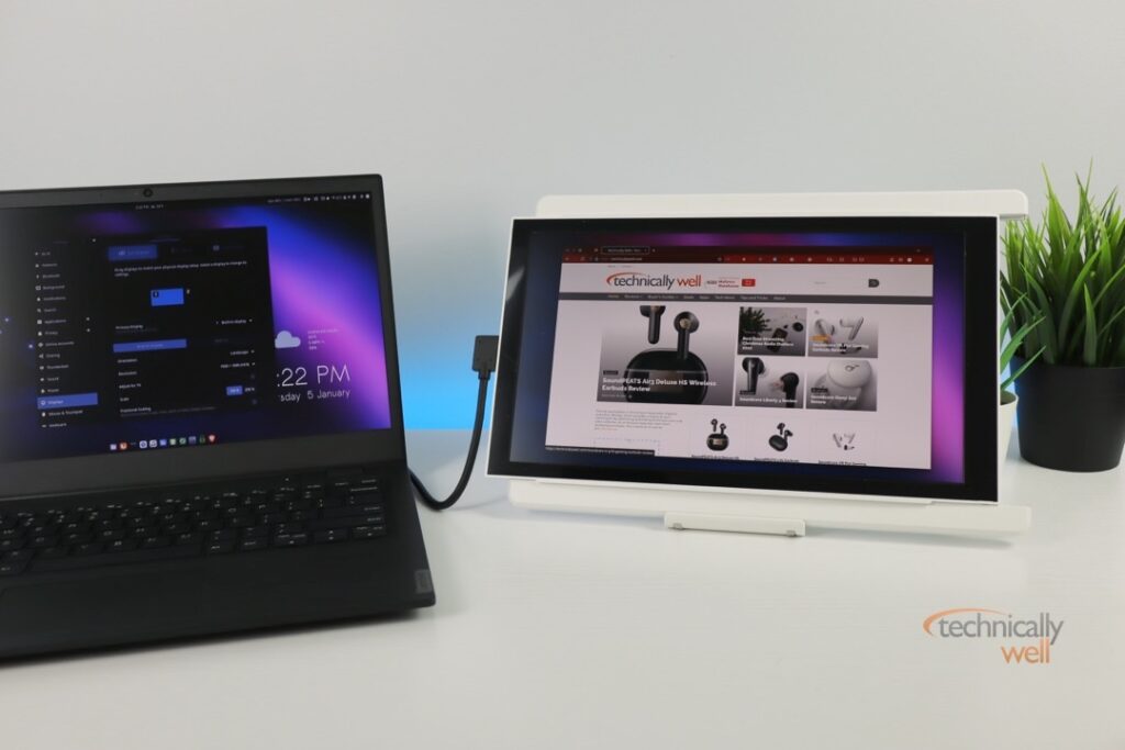 Lenovo (model 14w) laptop with Mobile Pixels Duex Lite propped up on a tablet stand (not included)